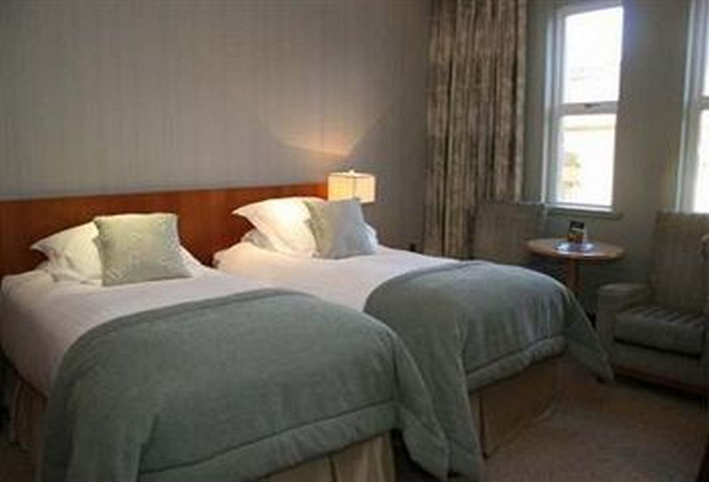 The Culloden Estate And Spa Холивуд Экстерьер фото A room at the hotel